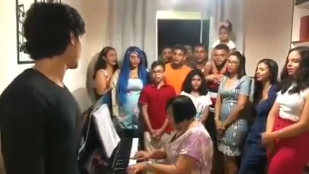 A student playing Hallelujah on the piano.