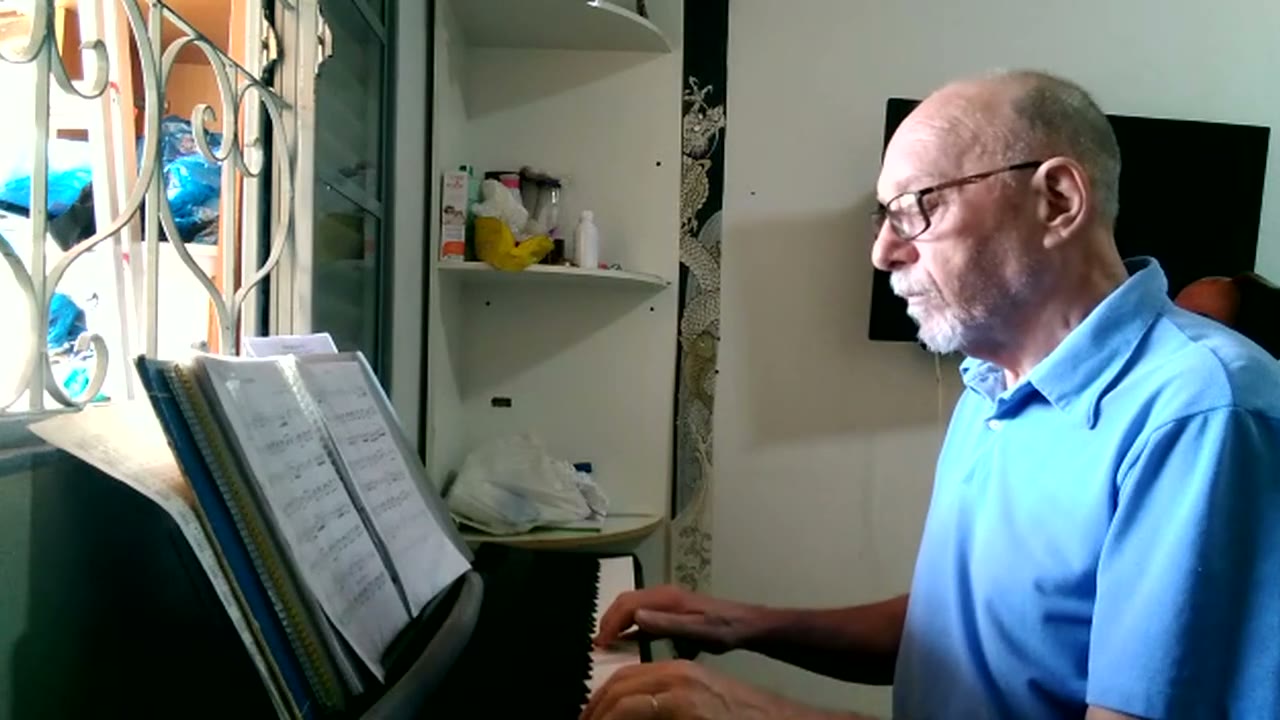 A student playing Nocturne Op. 9 No. 2 by Chopin on the piano.